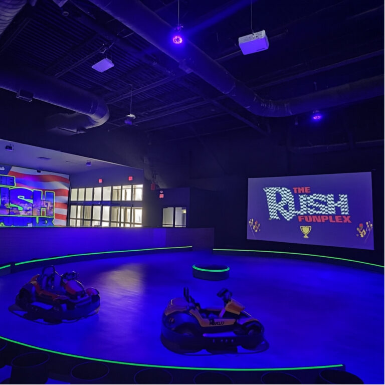 The Rush Funplex showcasing the exhilarating rush experience with vibrant attractions and excited visitors enjoying the activities.