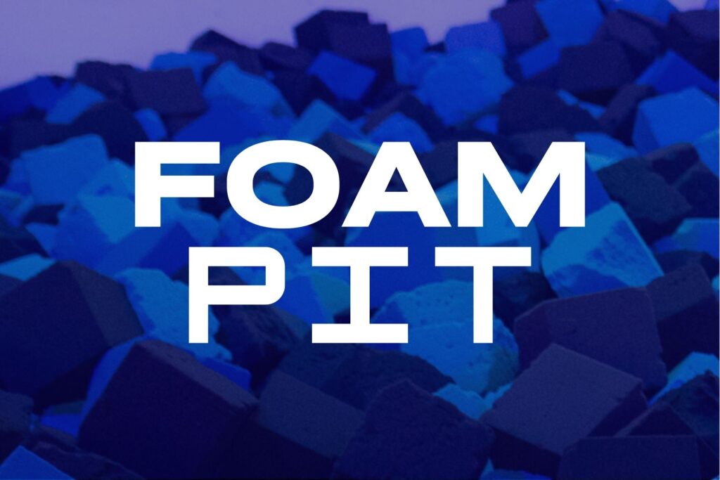 Foam pit logo featuring blue and black blocks, representing The Rush Funplex.