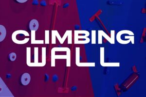 Climbing wall at The Rush Funplex, touted as the best climbing wall in the UK, featuring various routes for all skill levels.