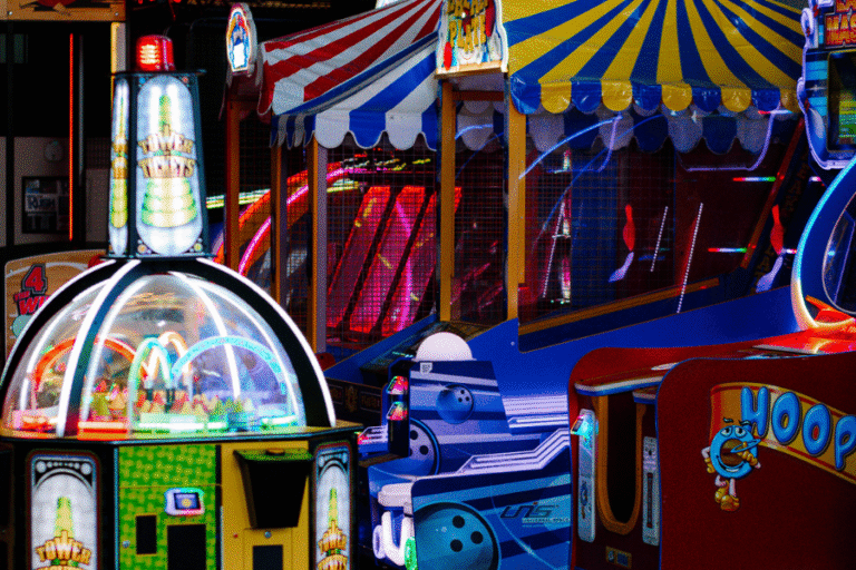 A vibrant carnival game room at The Rush Funplex, featuring a variety of colorful games and attractions for all ages.